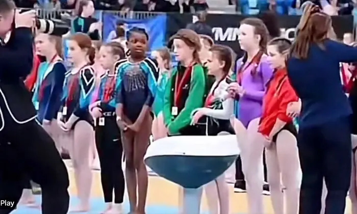 Young black gymnast overlooked at medal ceremony in Ireland (Image obtained at theguardian.com)