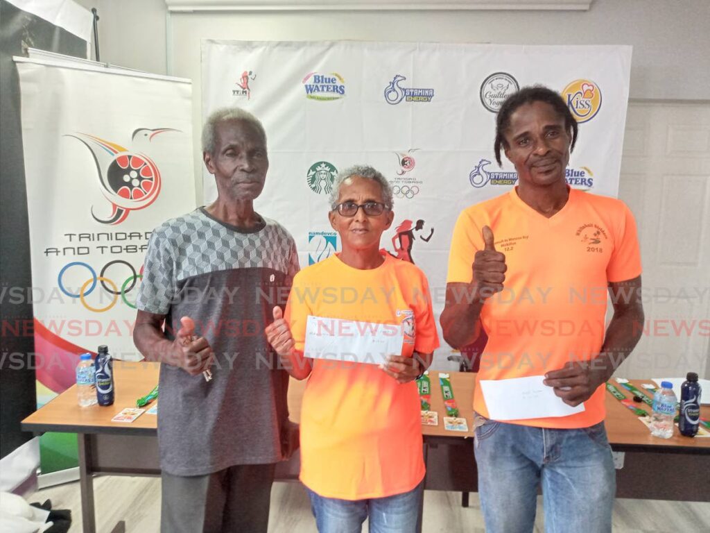 TT International Marathon 2023 runners Errol Jones, from left, Susannah Joefield and Nigel Simon celebrate after receiving their awards for being among the event’s top performers, on Monday, at the TT Olympic Committee’s headquarters, Woodford Street, Port of Spain. - Jelani Beckles (Image from newsday.co.tt)
