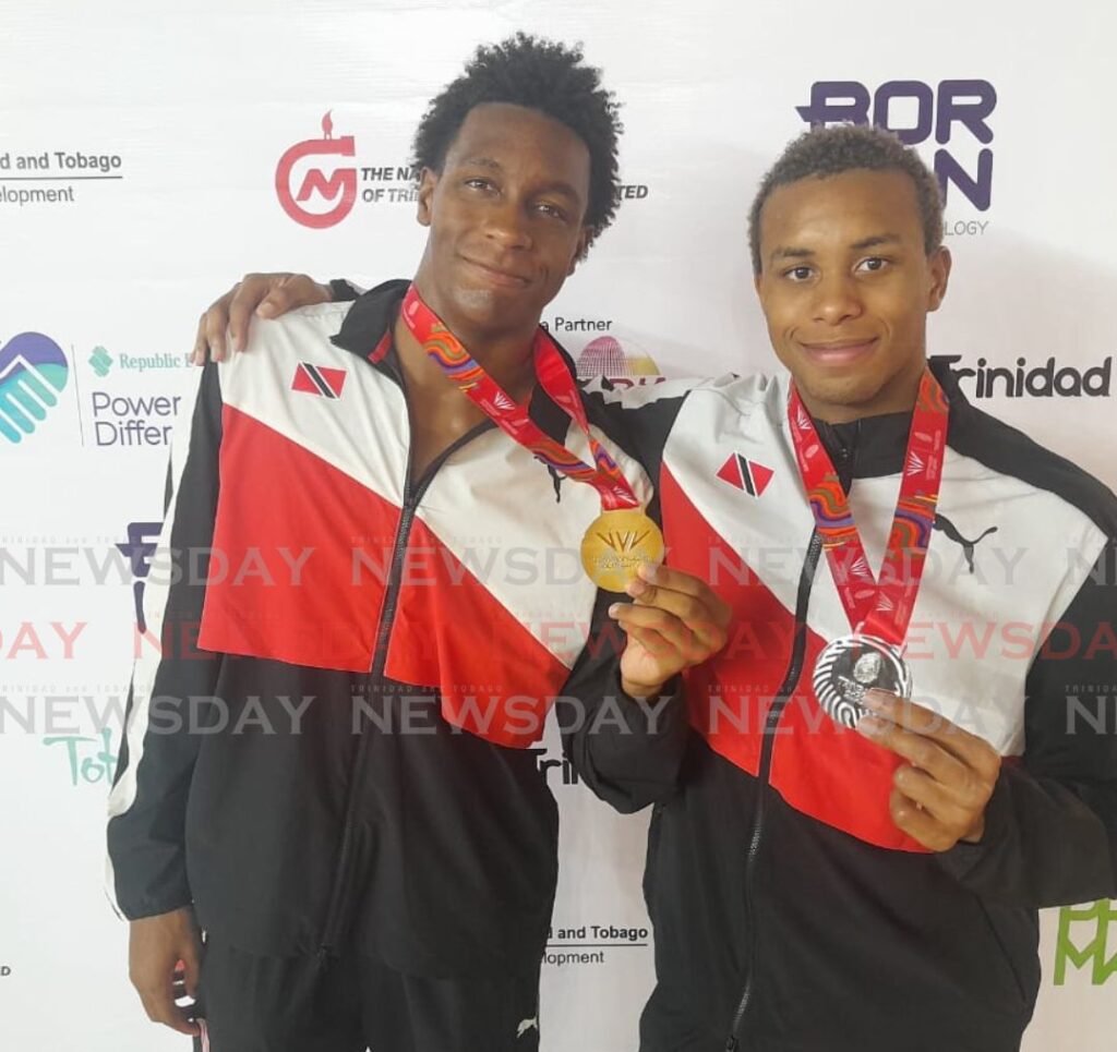 TT's Nikoli Blackman (L) and Zarek Wilson display their medals after competing, on Monday, at the 2023 Commonwealth Youth Games, at the National Aquatic Centre, Couva. - Photo by Jonathan Ramnanansingh (Image obtained at newsday.co.tt)