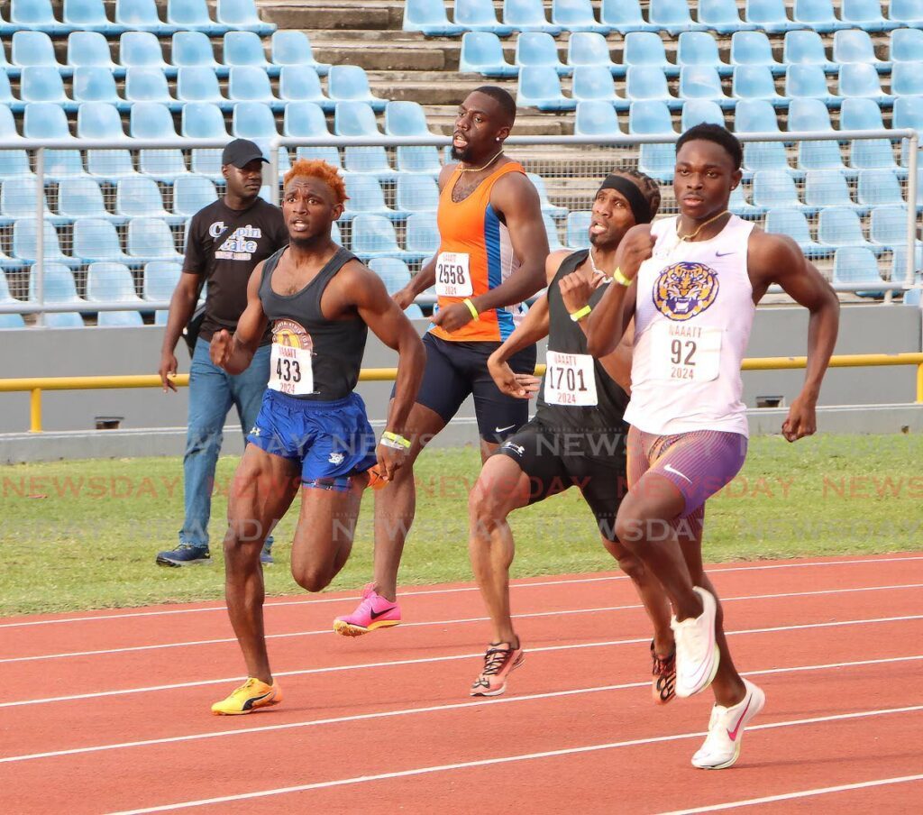 Shakeem McKay, right, on his way to victory as former national star Renny Quow, second from right, trails in the men's 400m heats at the NAAA Senior and Junior National Championships, at the Hasely Crawford Stadium, Mucurapo. - Angelo Marcelle (Image obtained at newsday.co.tt)