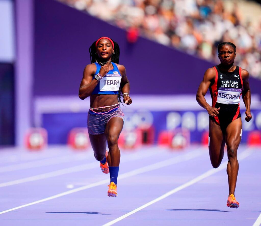 TT women's sprinter Leah Bertrand, right, and Twanisha Terry of the US, compete in a 100m heat at the 2024 Olympics on August 2 in Saint-Denis, France. Bertrand finished third to qualify for the semifinals. AP PHOTO. - (Image obtained at newsday.co.tt)