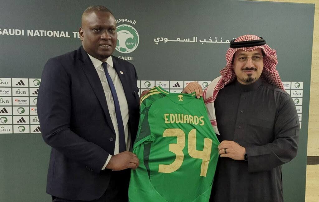 TTFA president Kieron Edwards, left, receives a customised jersey from Saudi Arabia Football Federation president Yasser Al Misehal at a MoU signing between the two associations in Riyadh, Saudi Arabia on December 17. - Photo courtesy TTFA Media (Image obtained at newsday.co.tt)