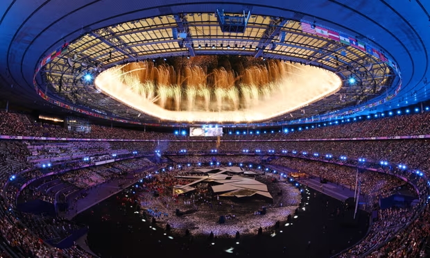 Yseult performs My Way at the Stade de France as a fireworks display lights up the closing ceremony of the Paris Olympics. Photograph: Andy Chua/Reuters (Image obtained at theguardian.com)