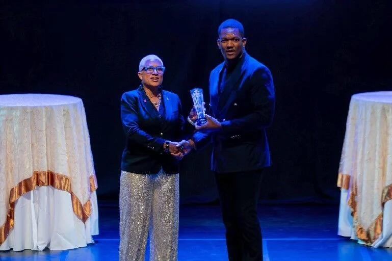 DUE REWARD: President of the Trinidad and Tobago Olympic Committee Diane Henderson, left, presents the Senior Sportsman of the Year award to Keshorn Walcott at the TTOC’s annual awards ceremony at Queen’s Hall, St Ann’s, on Monday night.  —Photo courtesy Team TTO Facebook (Image obtained at trinidadexpress.com)